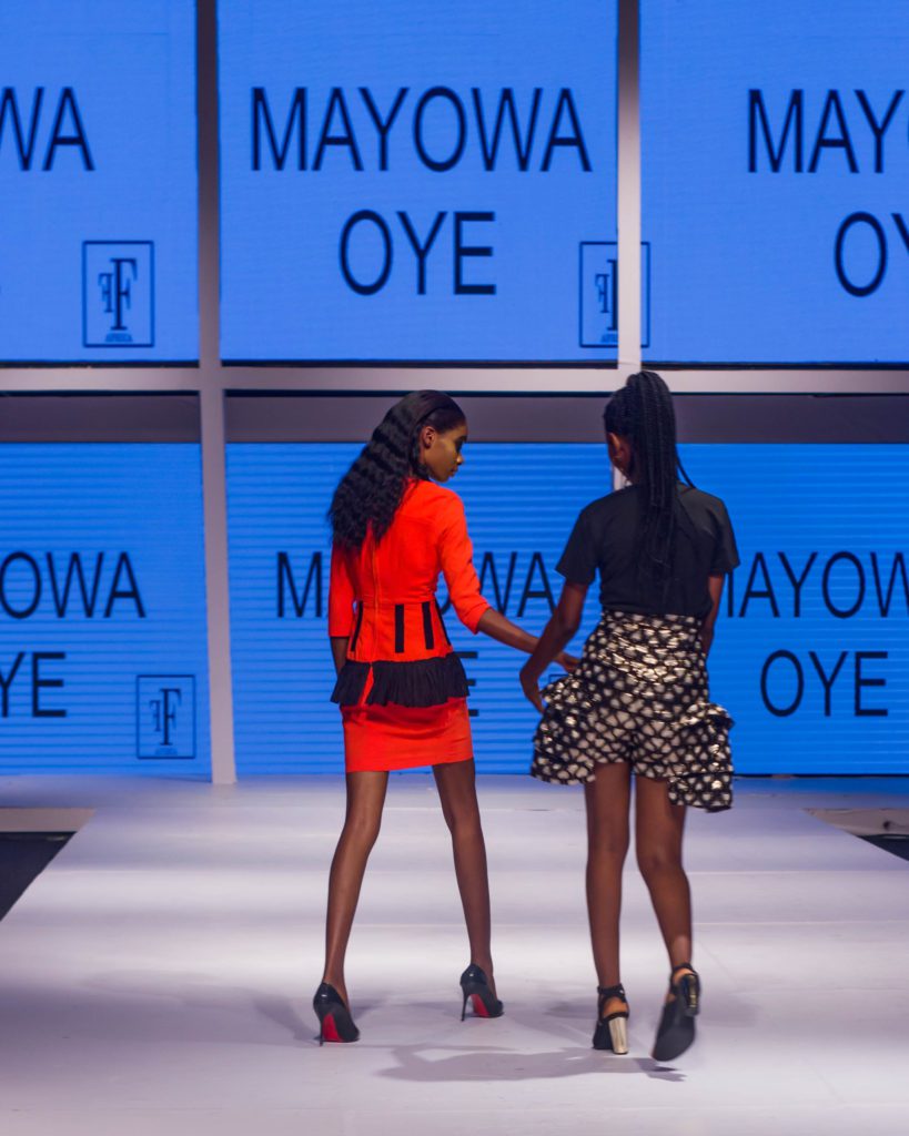 Mayowa Oye and a model wearing her design piece