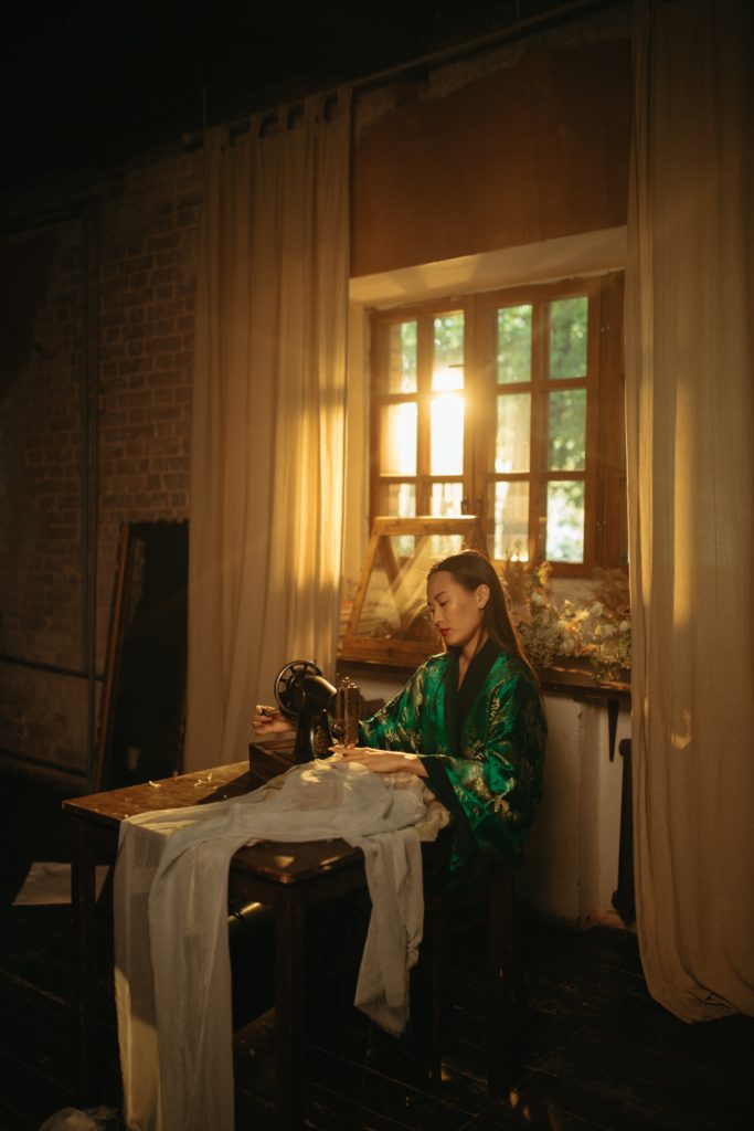 A tailor working on a sewing machine